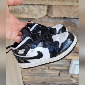 Jordan Black and White High-Top Sneakers